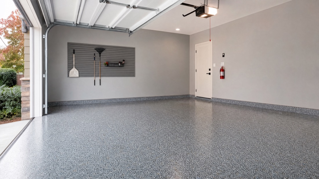 Two-car garage with a fresh gray-flake epoxy floor